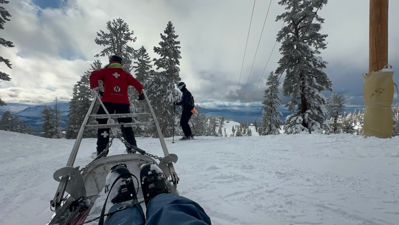 Madison's view of the bucket ride down with ski patrol after the fall that spelled the end of her ACL