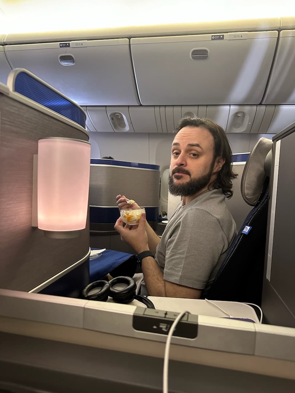 Shawn was delighted with his ice cream sundae during the flight to Tokyo