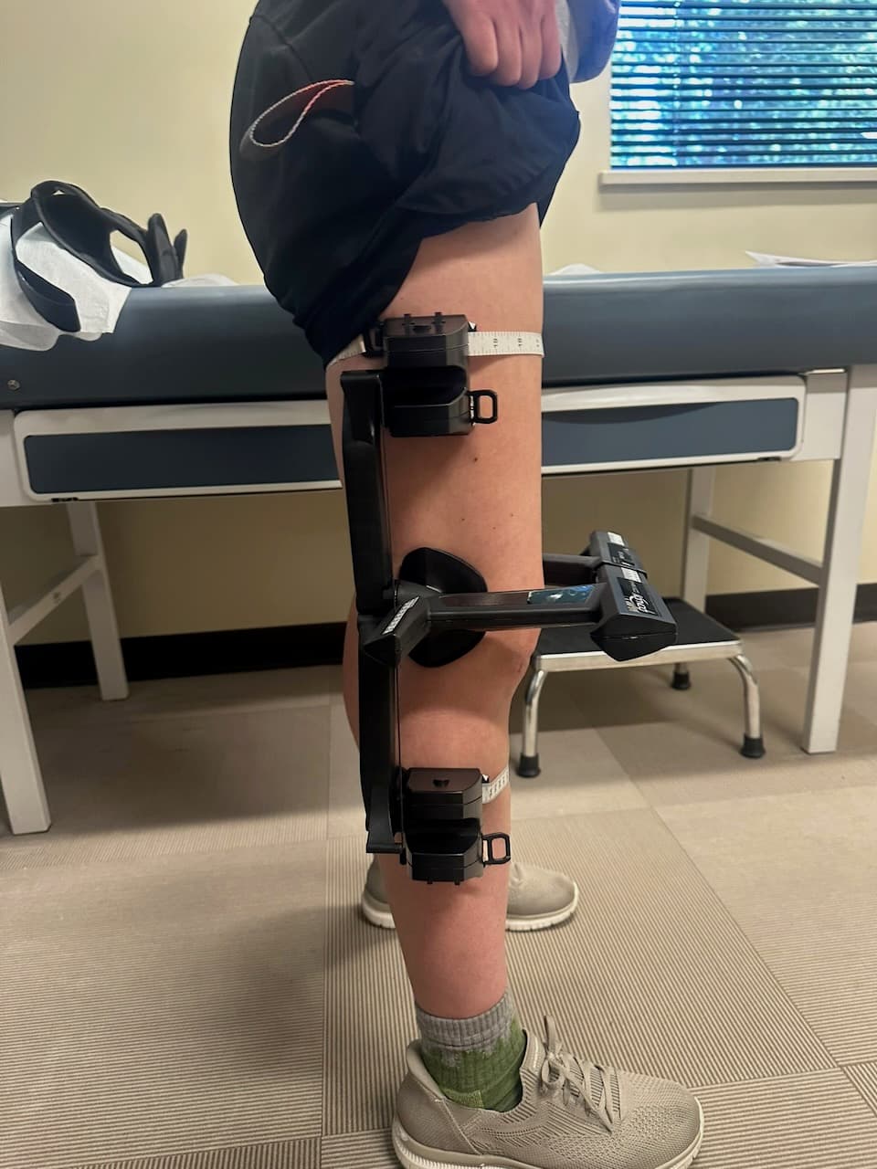 Madison getting measured for her custom activity brace