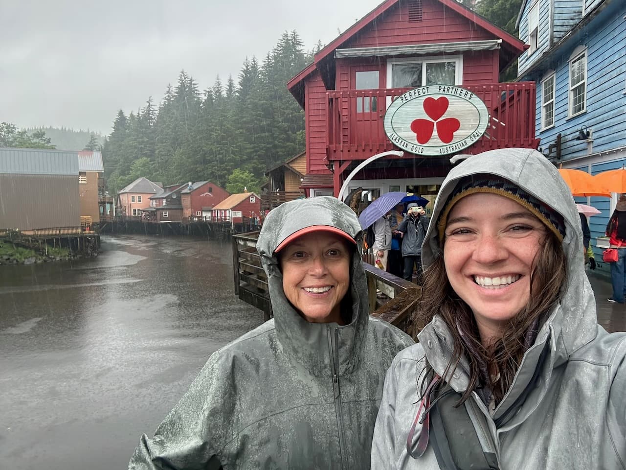 Carol and Madison walking the boardwalk shops in Ketchikan, Alaska