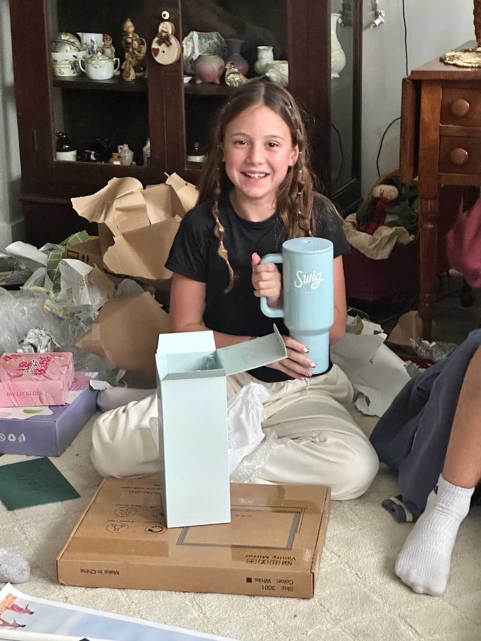 Sam with the last-minute and surprise hit gift: a Swig bottle and gift card