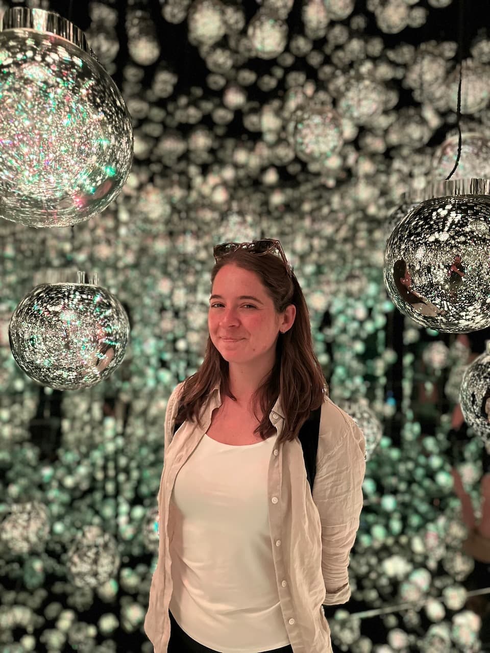 Madison in the middle of an exhibit at teamLabs Borderless in Tokyo