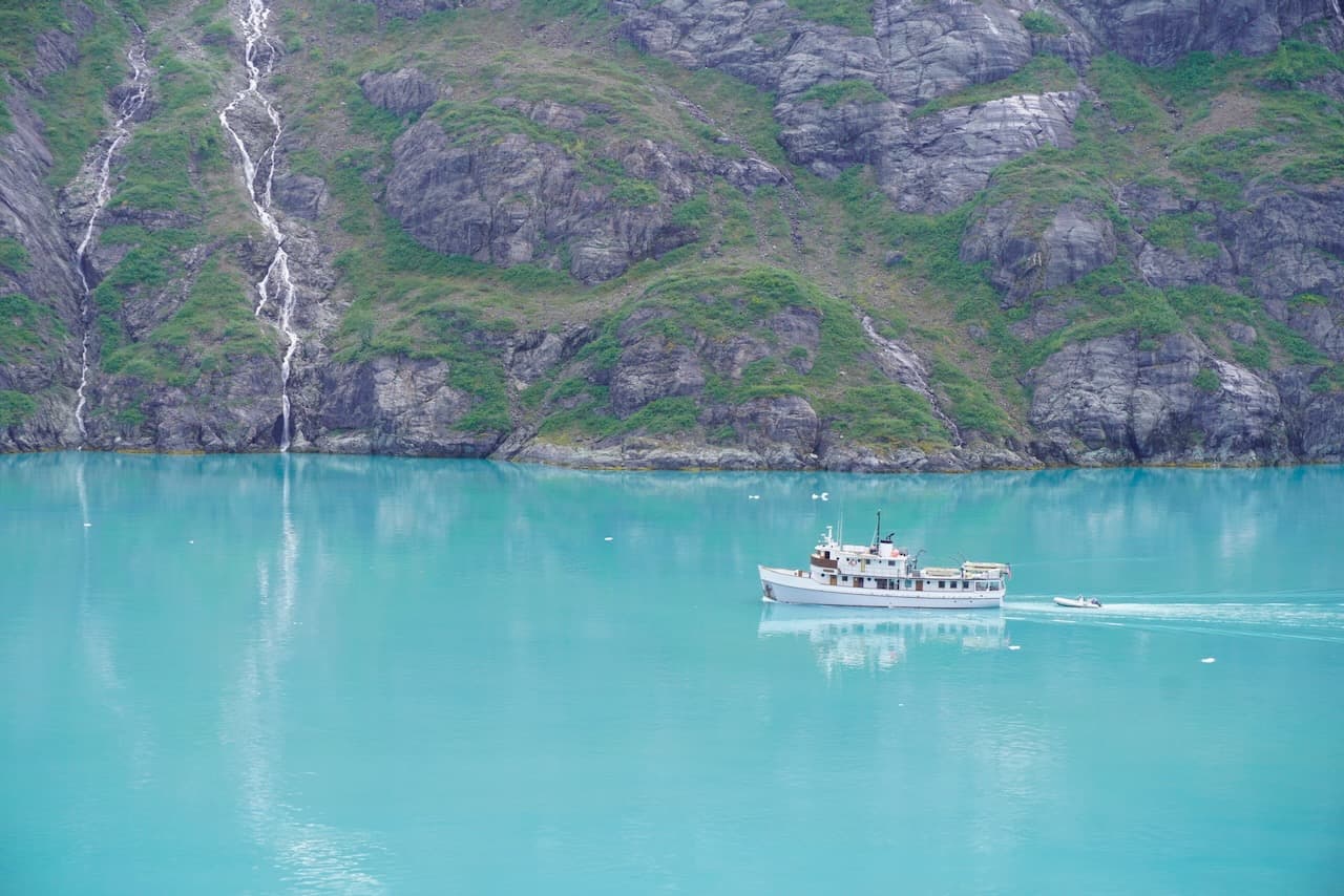 Spotting a smaller boat in the gorgeous waters of Glacier Bay
